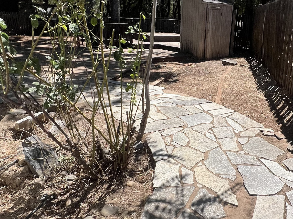 After: Flagstone pathway and backyard landscaping by Wacky Weedeating